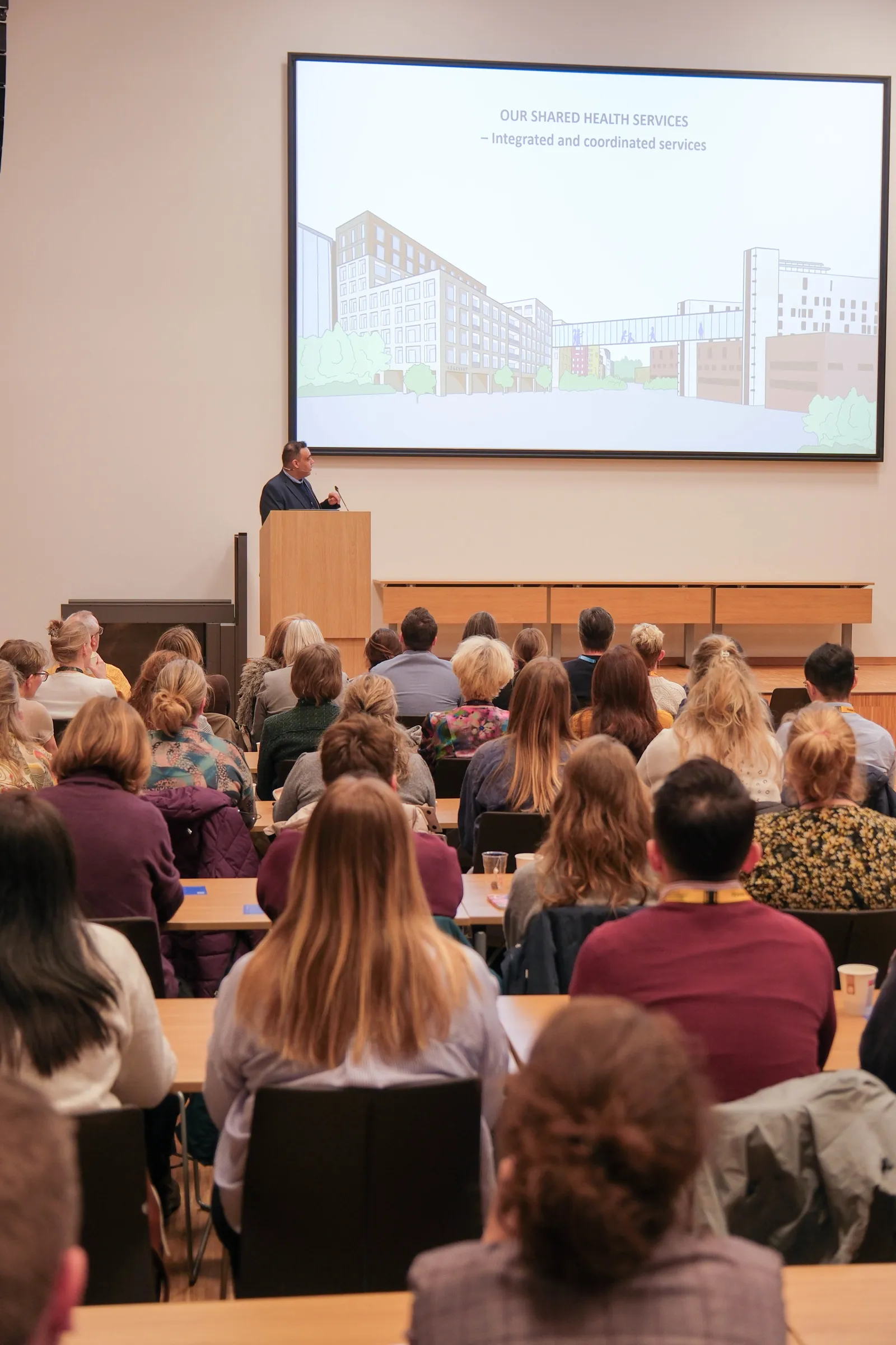 En person som holder en presentasjon for et publikum