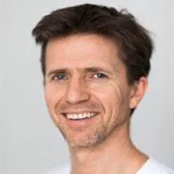 A man smiling for the camera