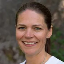 A close-up of a person smiling