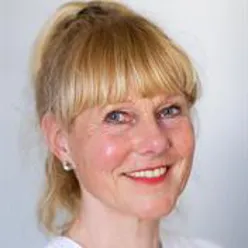 A close-up of a person smiling