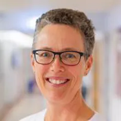 A close-up of a person smiling