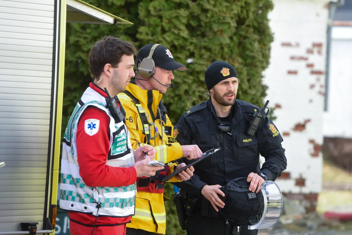 En gruppe menn i uniform