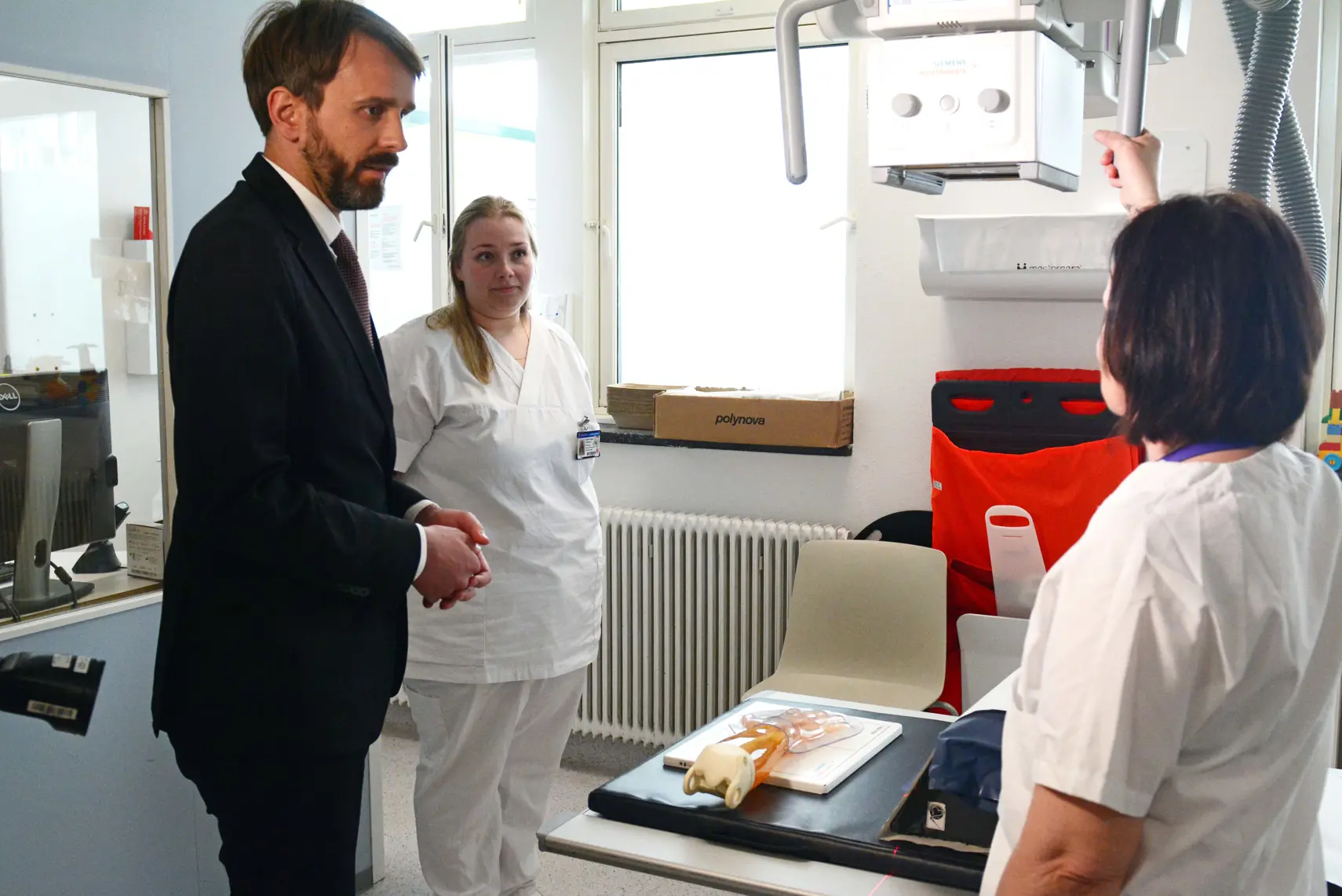 En gruppe mennesker i et rom