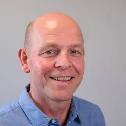 A man smiling for the camera