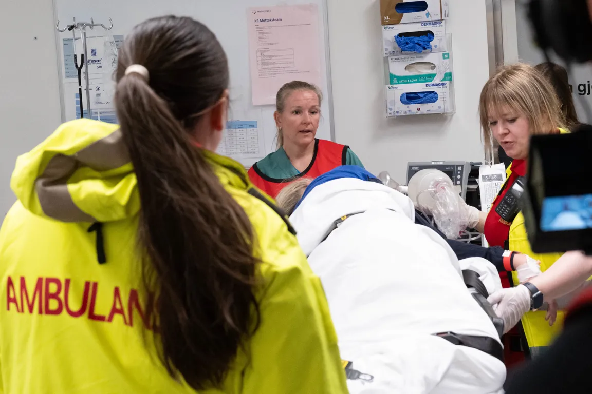 En gruppe personer i et rom