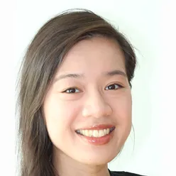 A close-up of a woman smiling