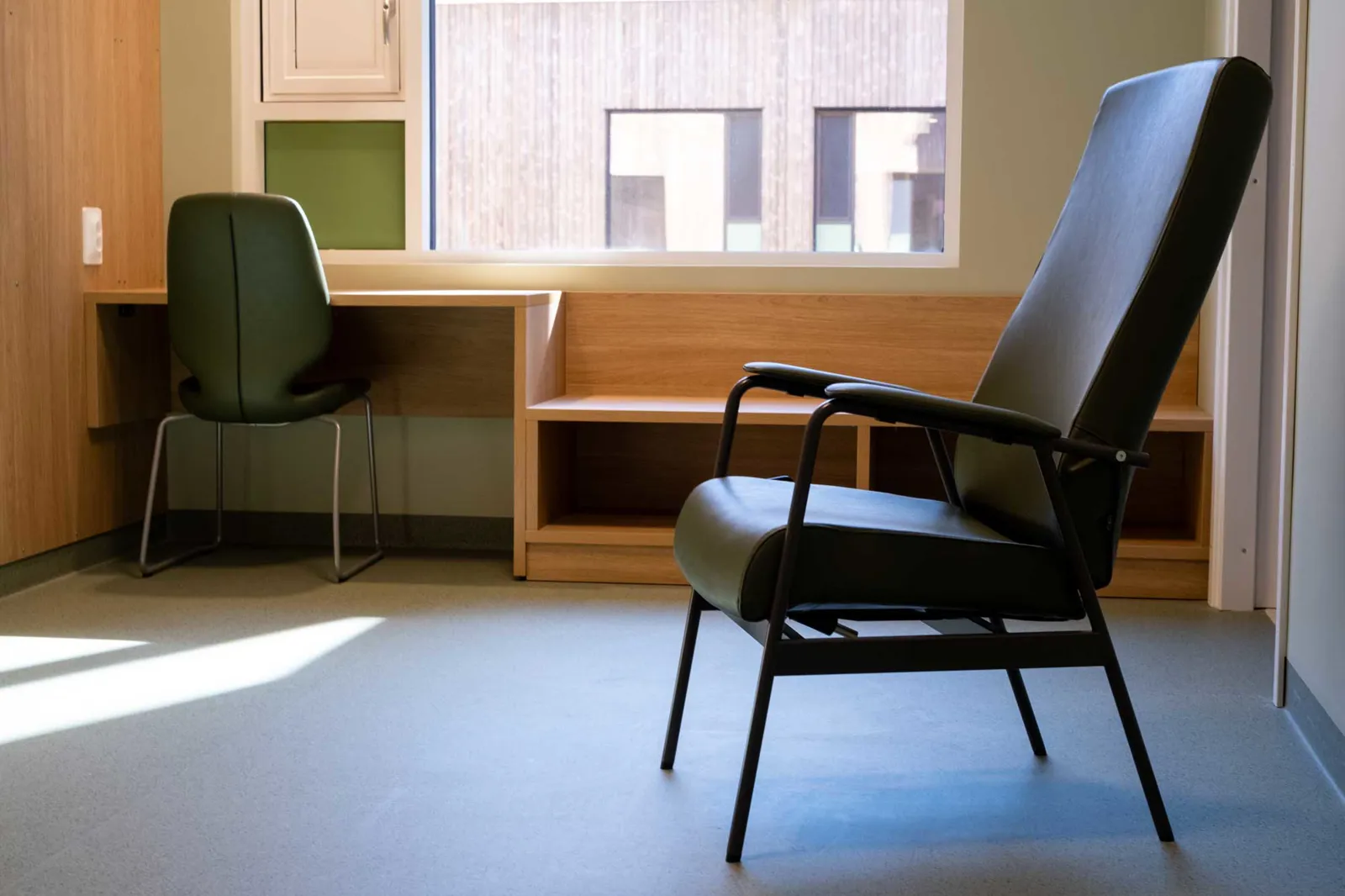 A couple of chairs in a room