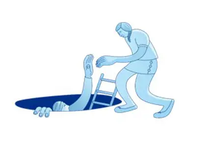 En person i blå dress som skyver en handlekurv