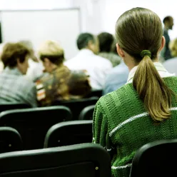 A person sitting in a classroom