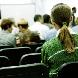 A person sitting in a classroom