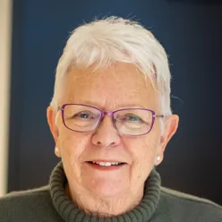 A man wearing glasses