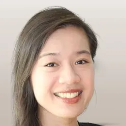 En person som smiler til kameraet